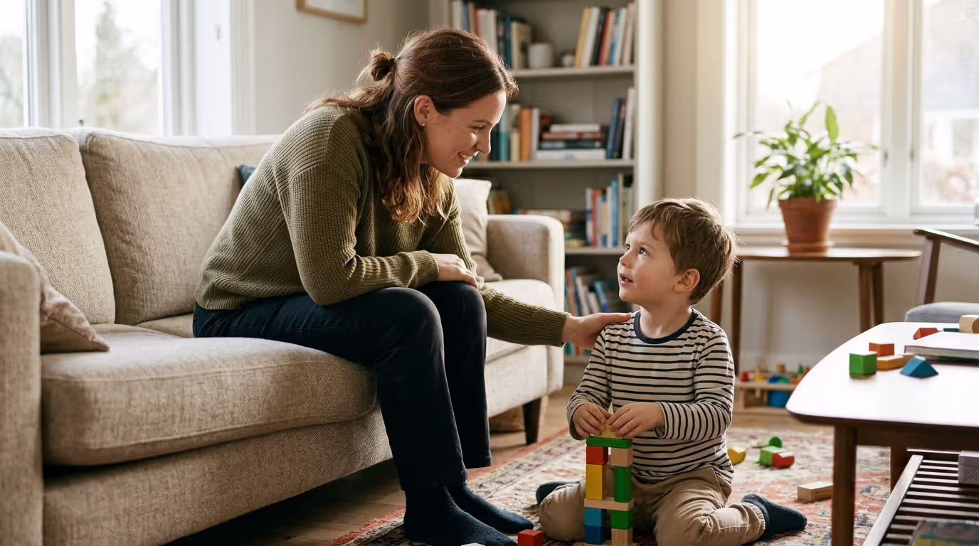 Parent confidently supporting child using positive developmental strategies at home