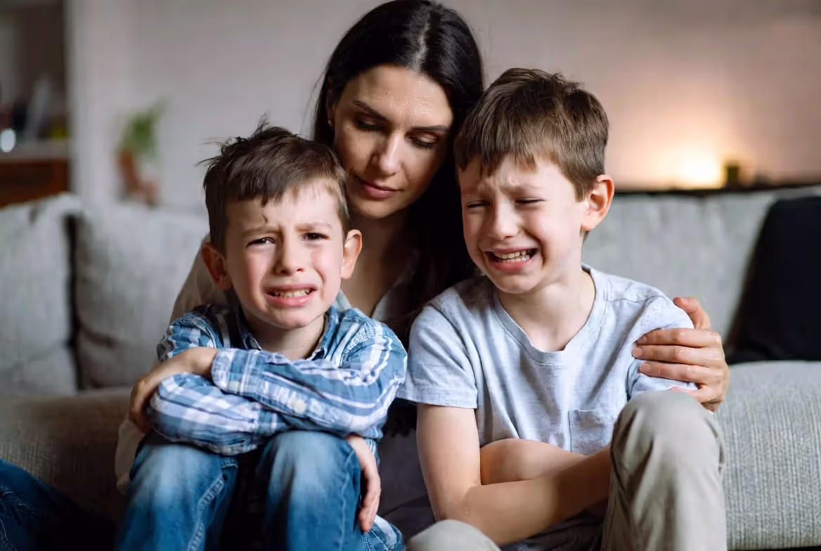 Parent helping child calm down using co-regulation and emotional support